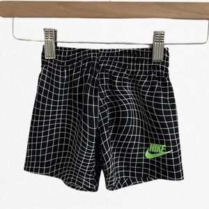 RARE Nike Black Athletic Shorts with Elastic Waistband and Green Logo